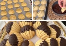 ŠKOLJKICE KEKSIĆI UMOČENI U ČOKOLADU…Neodoljivi keksići u obliku školjke – prhki, mirisni i djelimično umočeni u čokoladu za savršenu ravnotežu okusa! ŠKOLJKICE KEKSIĆI UMOČENI U ČOKOLADU…Neodoljivi keksići u obliku školjke – prhki, mirisni i djelimično umočeni u čokoladu za savršenu ravnotežu okusa! - featured image